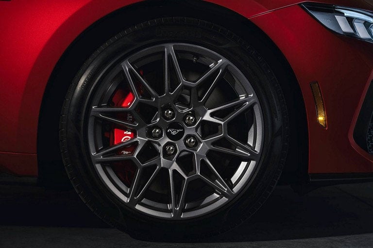 2024 Ford Mustang® model with a close-up of a wheel and brake caliper | Warrensburg Ford in Warrensburg MO